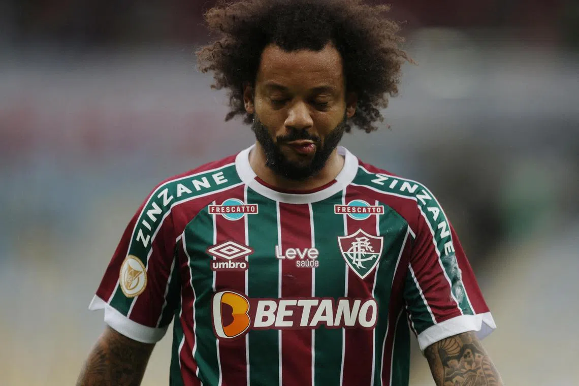 Fluminense's Marcelo, pictured in the match against Internacional, has been handed a three-match ban after causing a horrific injury to another player.