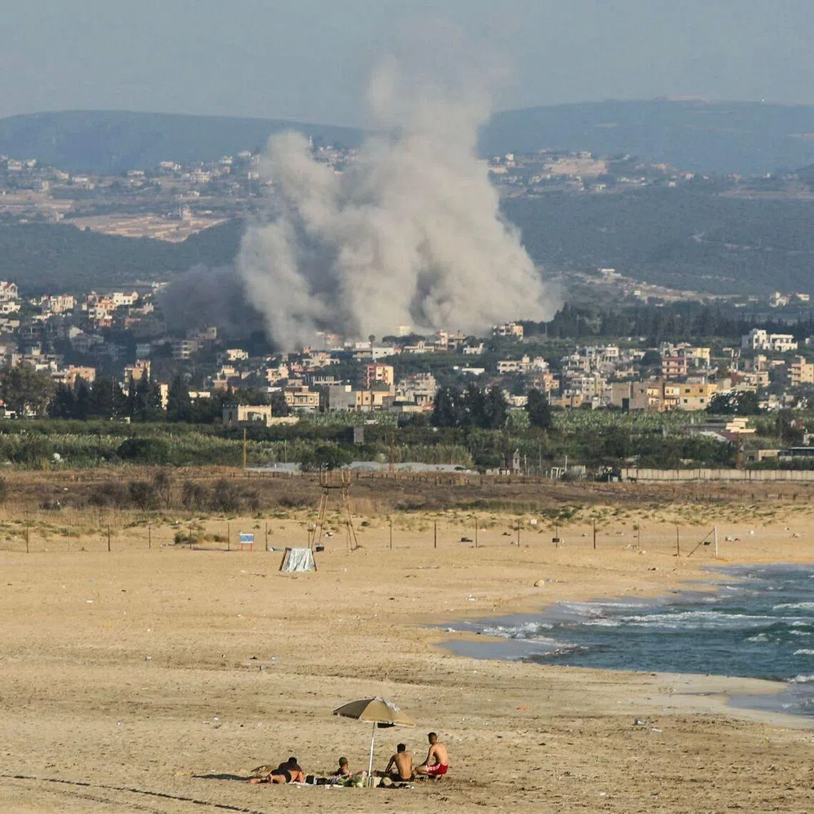 Smoke rises from the site of an Israeli air strike on a village in Tyre, Lebanon, on June 8. Israel’s army for the first time warned the entire city of Tyre to evacuate ahead of strikes on June 9.