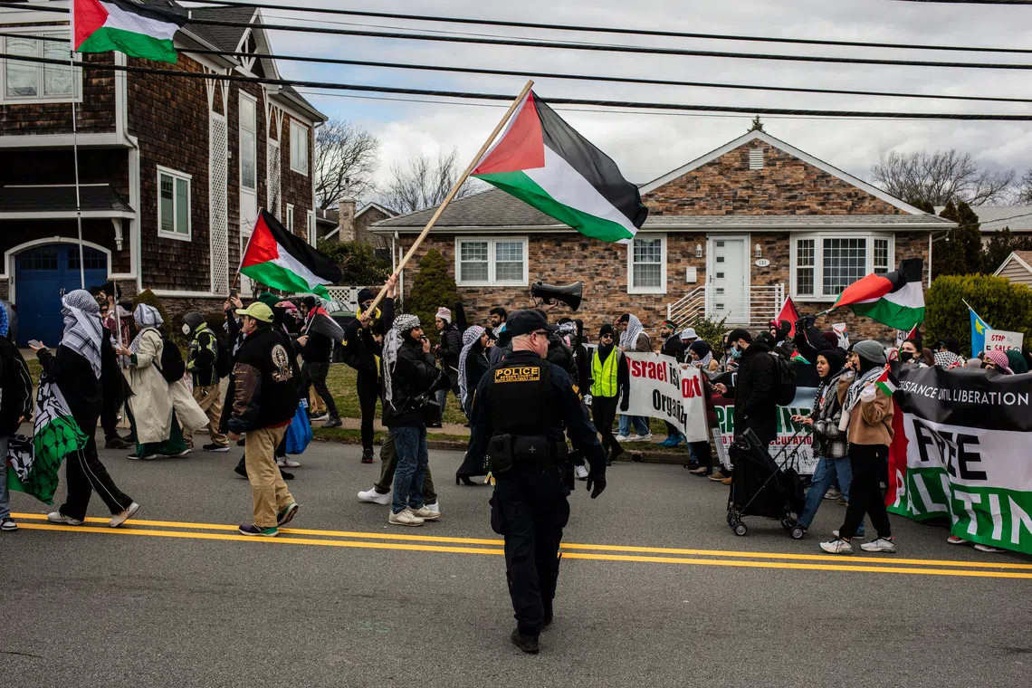 Palestinian demonstrators march in Teaneck, New Jersey, on March 10, 2024.