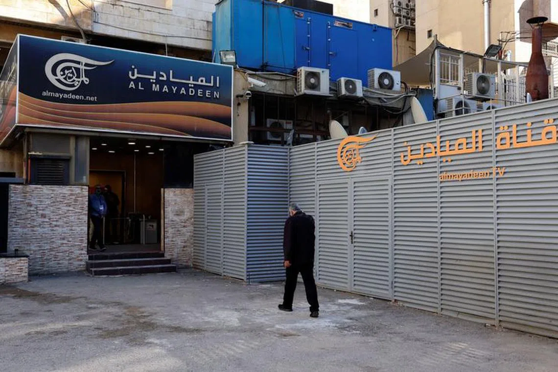 A man walks outside a building housing Lebanon-based Al Mayadeen TV channel, in Beirut, Lebanon November 21, 2023. REUTERS/Aziz Taher
