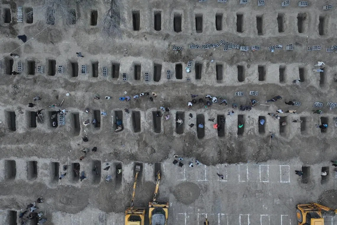 Graves are being prepared for the victims following an Israeli strike on a school in Minab, Iran, March 2, 2026. Iranian Foreign Media Department/WANA (West Asia News Agency)/Handout via REUTERS