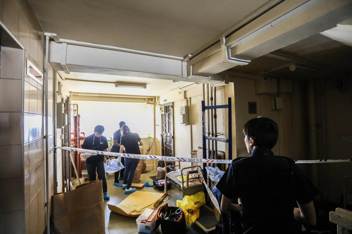 Police officers gathering evidence from inside the unit at Block 191 Lorong 4 Toa Payoh on 1 September 2019. An elderly woman was identified as Madam Lim Soy Moi, was found motionless in the unit and was pronounced dead by paramedics. An 82-year-old man, identified as Pak Kian Huat, was subsequently arrested in connection with Madam Lim’s death.