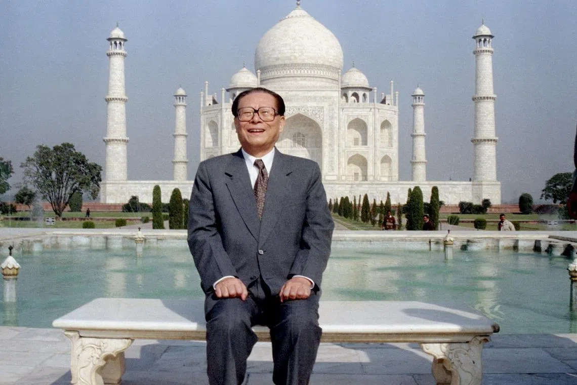 Chinese President Jiang Zemin poses in front of the Taj Mahal in Agra, India on Nov 30, 1996. 