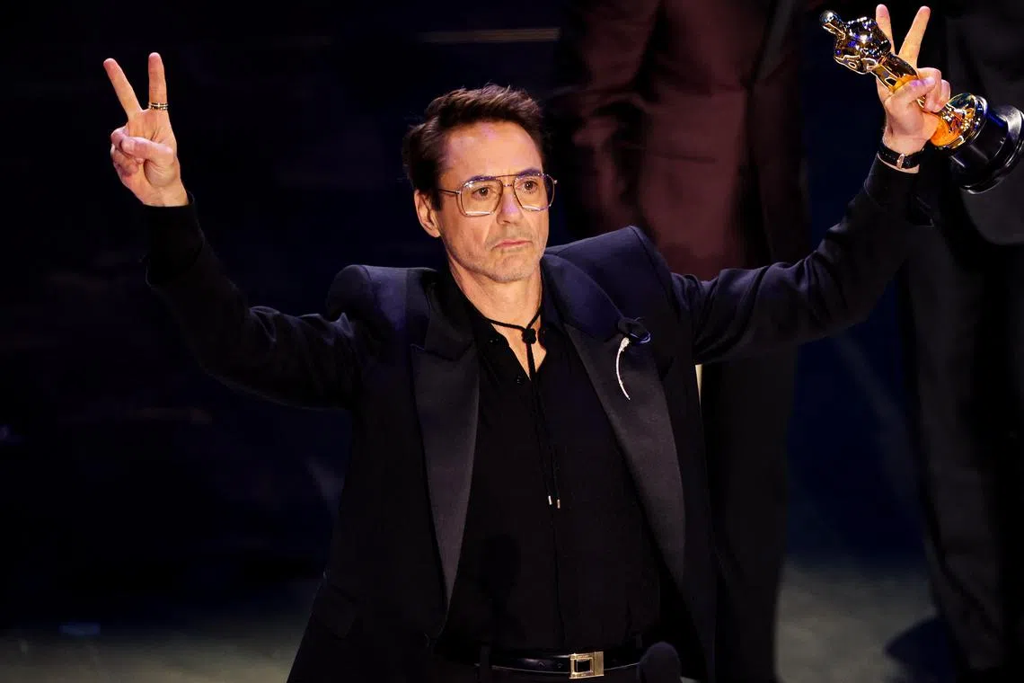 Actor Robert Downey Jr. wins the Oscar for Best Supporting Actor for Oppenheimer during the 96th Academy Awards in Hollywood on March 10, 2024.