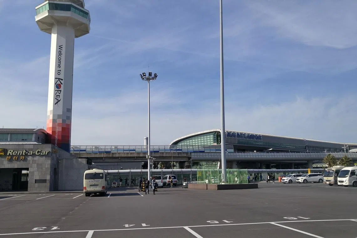 The officer had two bullets with him when he was about to board a plane bound for Gimpo Airport at Jeju Airport (pictured) at around 8.40pm local time on June 28.