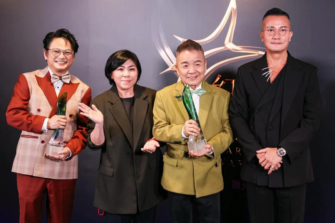 Four of the five hosts of Love 972 The Breakfast Quartet, which was named Best Radio Programme. They are (from left) Dennis Chew, Chen Biyu, Marcus Chin and Chen Hanwei. The fifth host, Mark Lee, was not present.