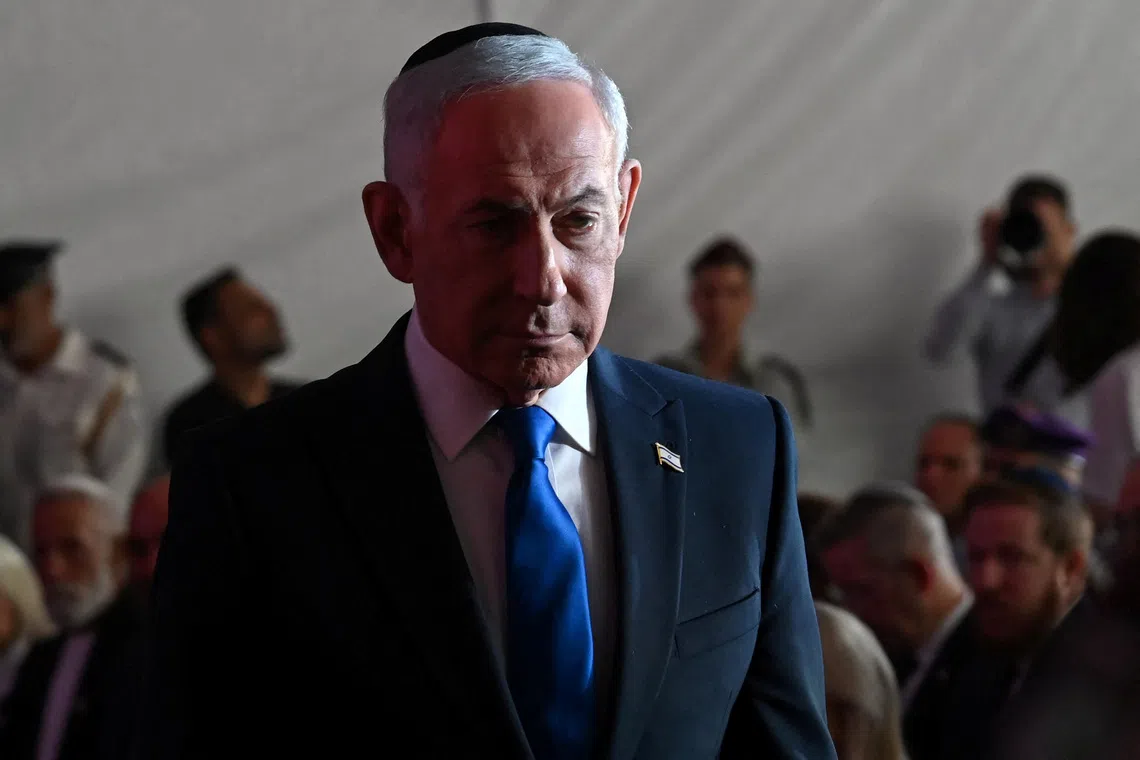 Israeli Prime Minister Benjamin Netanyahu attends the State Memorial Ceremony for the three year anniversary of the October 7, 2023, Hamas attack, in remembrance of Israel Defense Forces and security members who fell in the War of Redemption in the Mt. Herzl Cemetery, Jerusalem, on Monday, October 5, 2026.  DEBBIE HILL/Pool via REUTERS