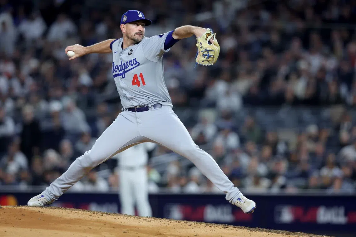 FILE PHOTO: Oct 29, 2024; New York, New York, USA; Los Angeles Dodgers pitcher Daniel Hudson (41) throws during the third inning against the New York Yankees in game four of the 2024 MLB World Series at Yankee Stadium. Mandatory Credit: Brad Penner-Imagn Images/File Photo