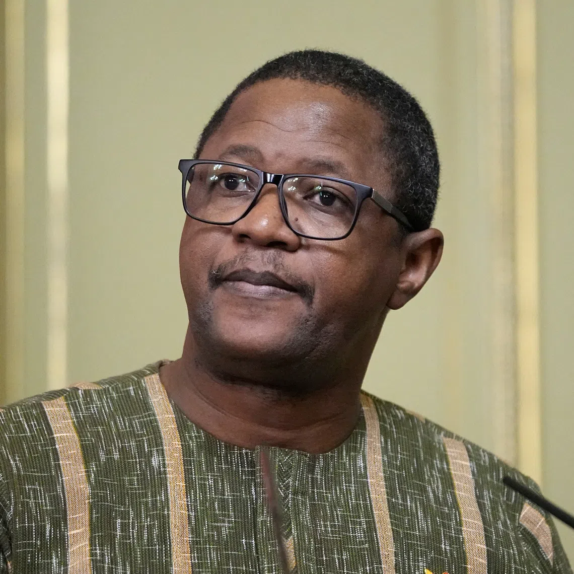 Burkina Faso Foreign Minister Karamoko Jean Marie Traore attends a joint news conference following a meeting of Russian foreign Minister Sergey Lavrov with foreign Ministers of the Confederation of Sahel States in Moscow, Russia, Thursday, April 3, 2025.     Pavel Bednyakov/Pool via REUTERS