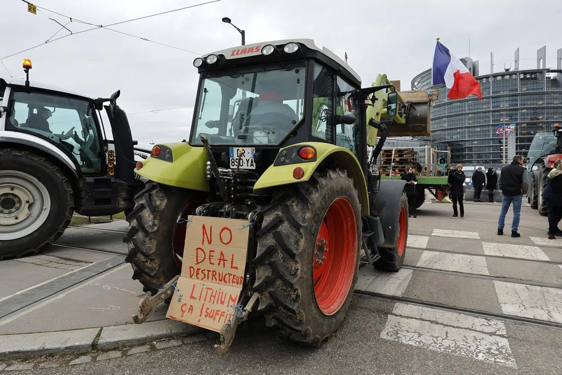 Farmers block the entrance of the European Parliament during a protest action in Strasbourg, France, on Feb 6, 2024.