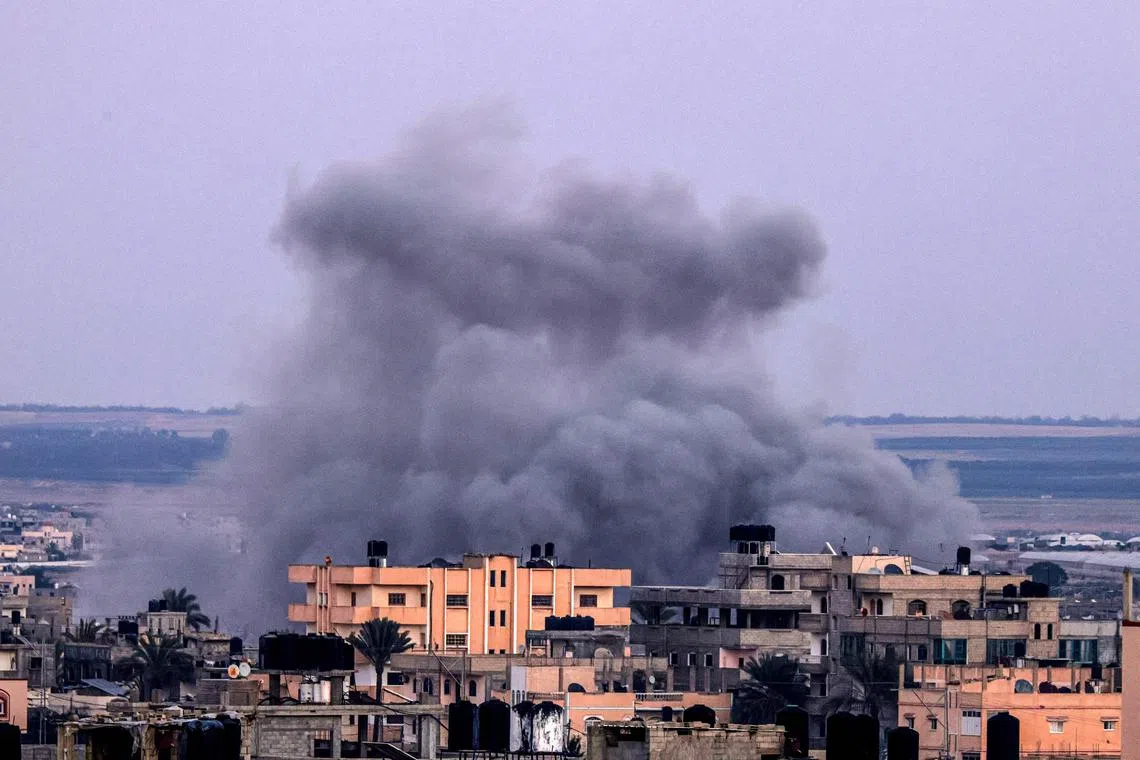 Smoke billows following Israeli airstrikes on Rafah in the southern Gaza Strip on Nov 18, 2023.