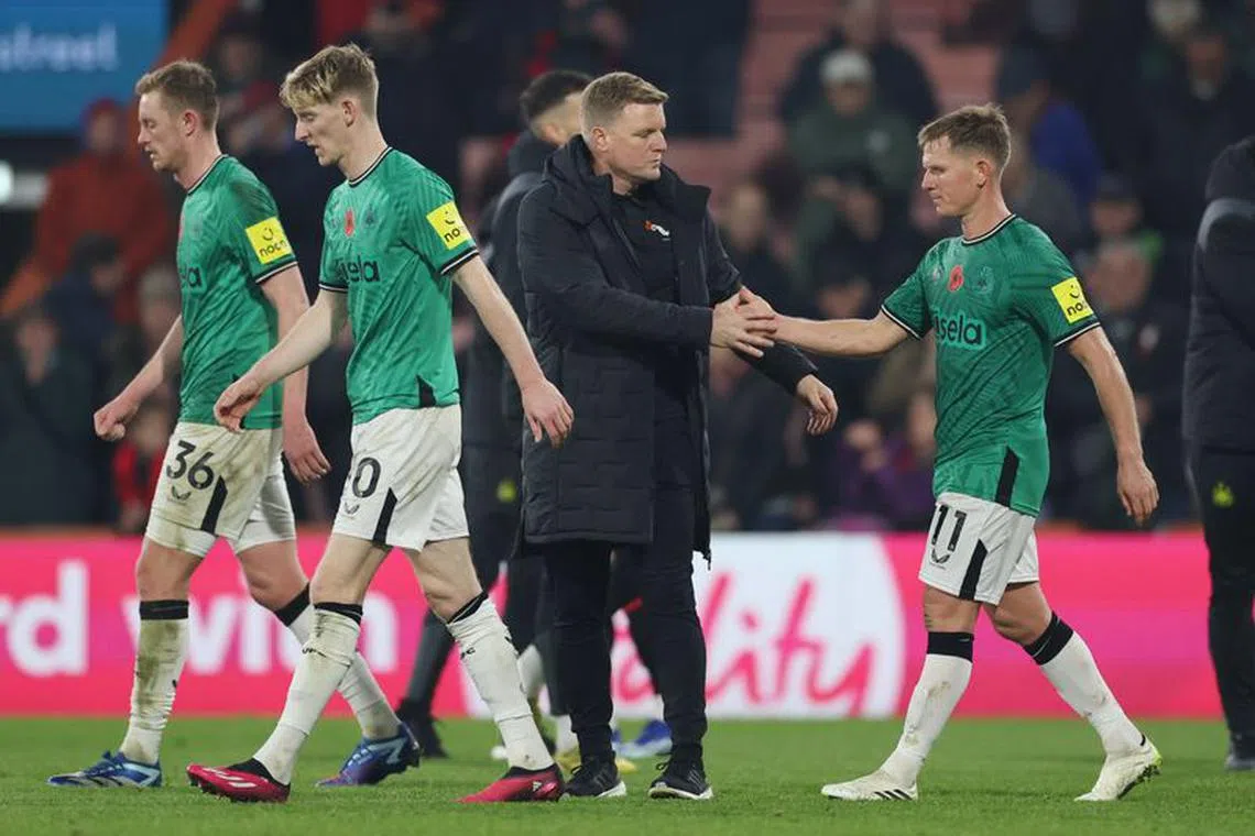 Soccer Football - Premier League - AFC Bournemouth v Newcastle United - Vitality Stadium, Bournemouth, Britain - November 11, 2023 Newcastle United's Matt Ritchie with manager Eddie Howe after the match REUTERS/Ian Walton/ File photo