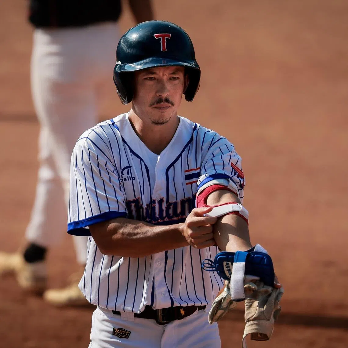Thailand's Joe Daru in action during a 6-4 win over Singapore in a SEA Games match on Dec 9.