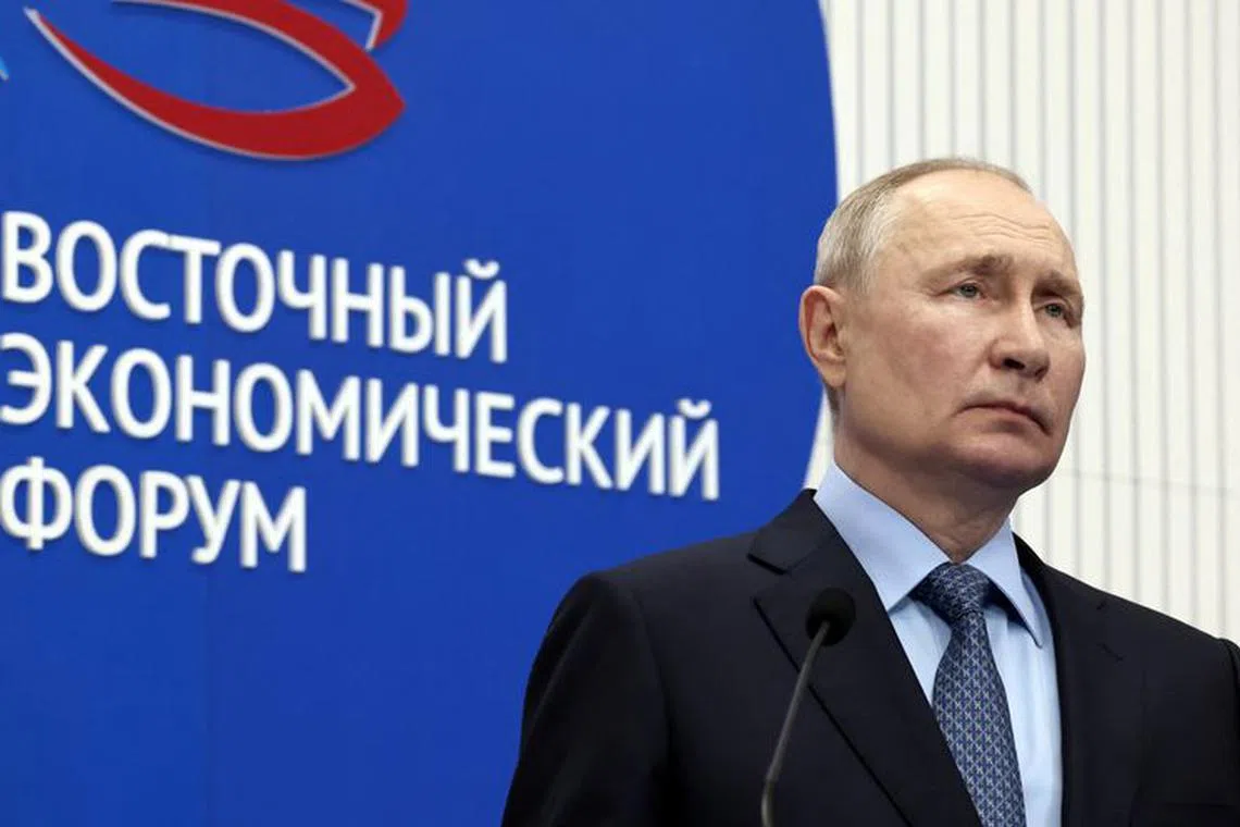 Russian President Vladimir Putin listens to a report presentation on the development of Russia's far eastern regions held via a video link in Vladivostok, Russia, September 11, 2023. A board reads: \"Eastern Economic Forum\". Sputnik/Vyacheslav Prokofyev/Pool via REUTERS ATTENTION EDITORS - THIS IMAGE WAS PROVIDED BY A THIRD PARTY.