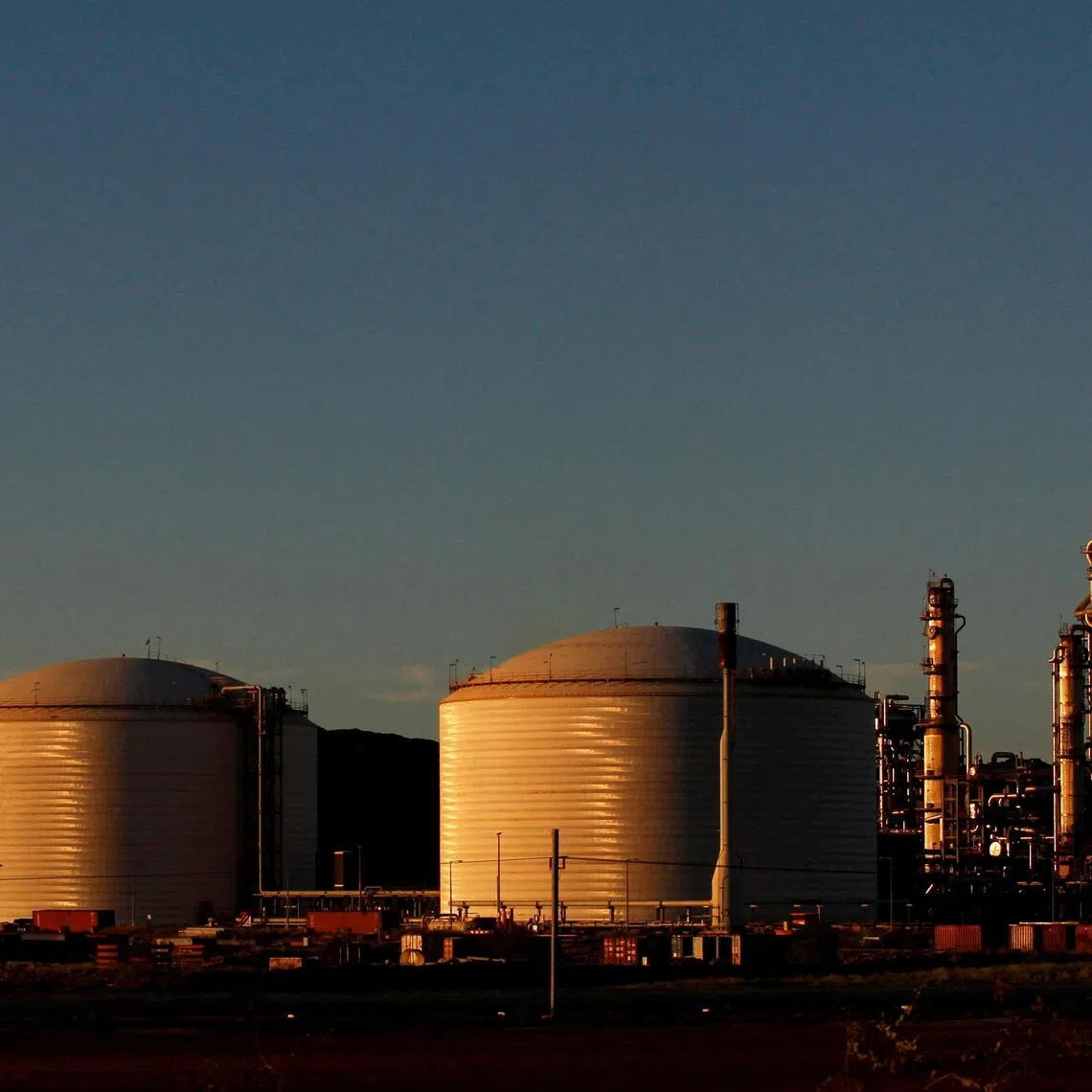 Woodside's gas plant is seen at sunset in Burrup at the Pilbara region in Western Australia. PHOTO: REUTERS