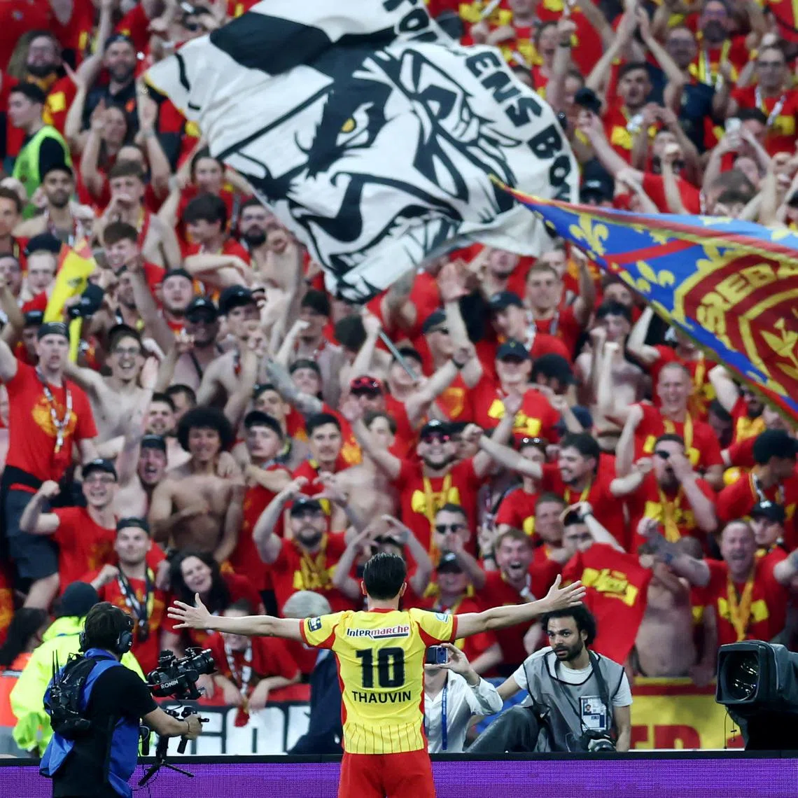 Soccer Football - Coupe de France - Final - RC Lens v OGC Nice - Stade de France, Saint Denis, France - May 22, 2026 RC Lens' Florian Thauvin celebrates scoring their first goal REUTERS/Stephane Mahe