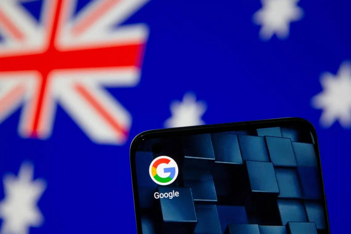 FILE PHOTO: Smartphone with google app icon is seen in front of the displayed Australian flag in this illustration taken, January 22, 2021. REUTERS/Dado Ruvic/Illustration/File Photo