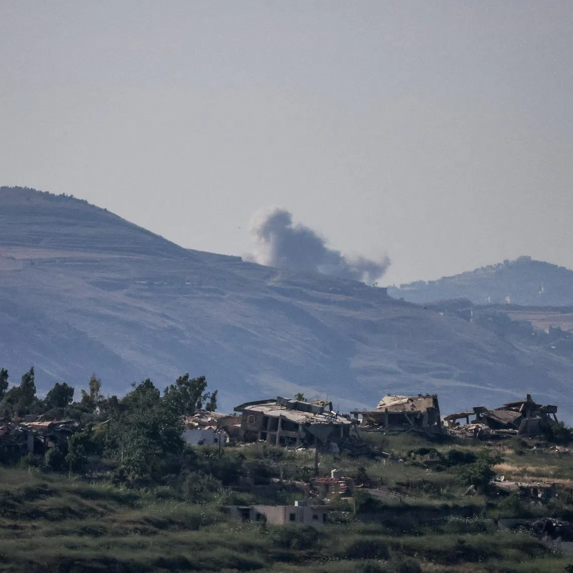 Smoke rises in southern Lebanon following an explosion, as seen from the Israeli side of the Israel-Lebanon border, in northern Israel, June 10, 2026. REUTERS/Ammar Awad