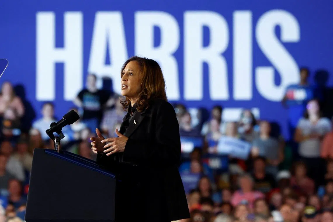 Democratic presidential nominee and U.S. Vice President Kamala Harris gestures as she speaks during a campaign event in Wilkes-Barre, Pennsylvania, U.S., September 13, 2024. REUTERS/Evelyn Hockstein