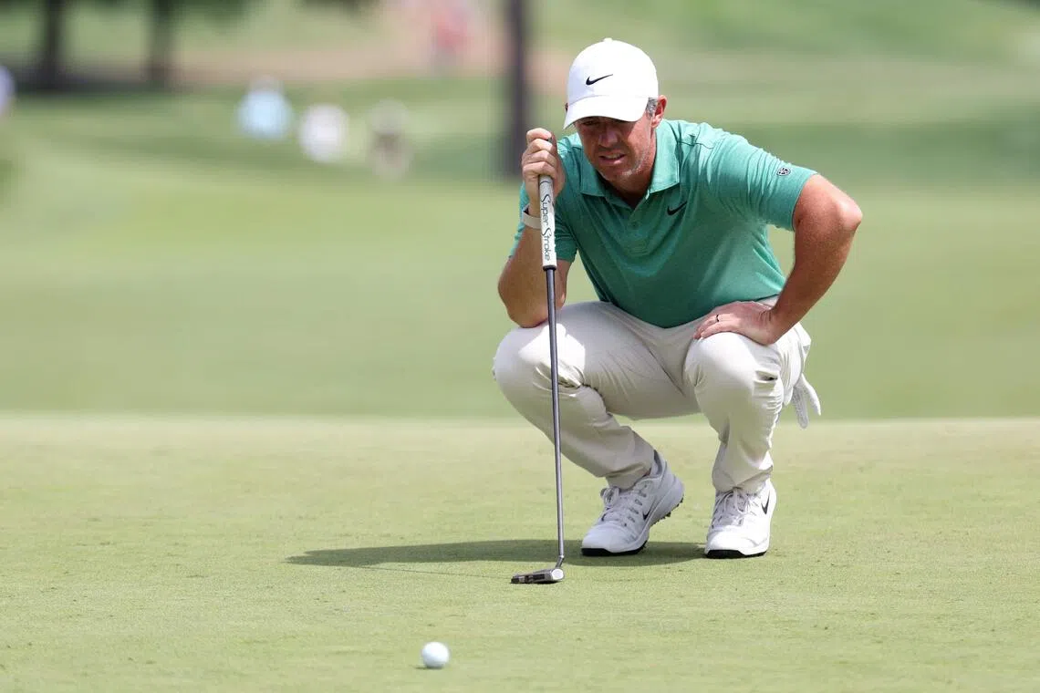Rory McIlroy of Northern Ireland lines up a putt on the seventh green during the final round of the 2026 BMW Championship.