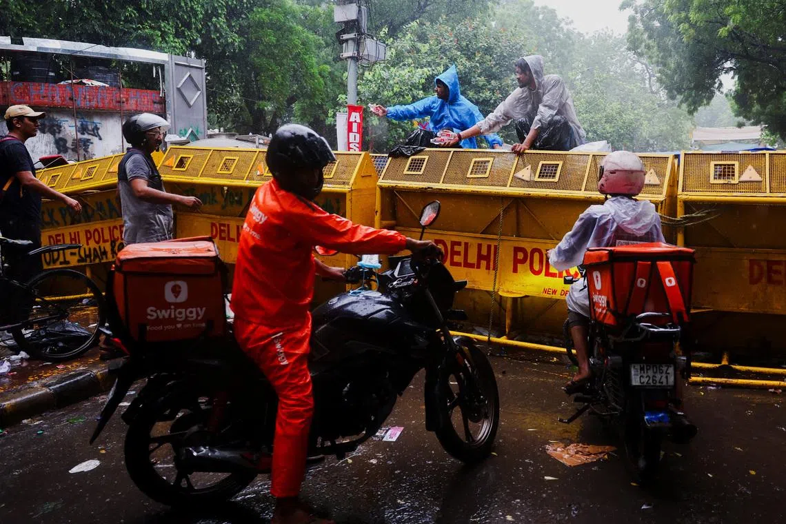 Food, fury and supporters near and far keep India protest alive