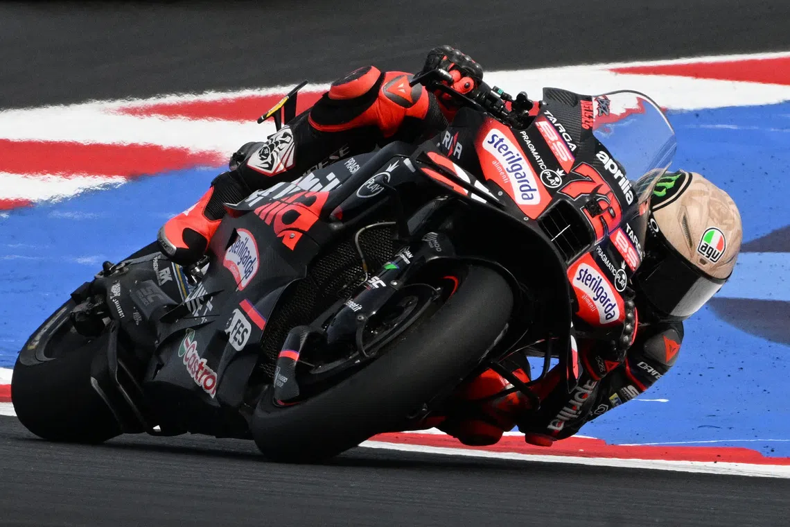 MotoGP - San Marino Grand Prix - Misano World Circuit Marco Simoncelli, Misano, Italy - Spetember 14, 2025 Aprilia Racing's Marco Bezzecchi in action during the race REUTERS/Jennifer Lorenzini