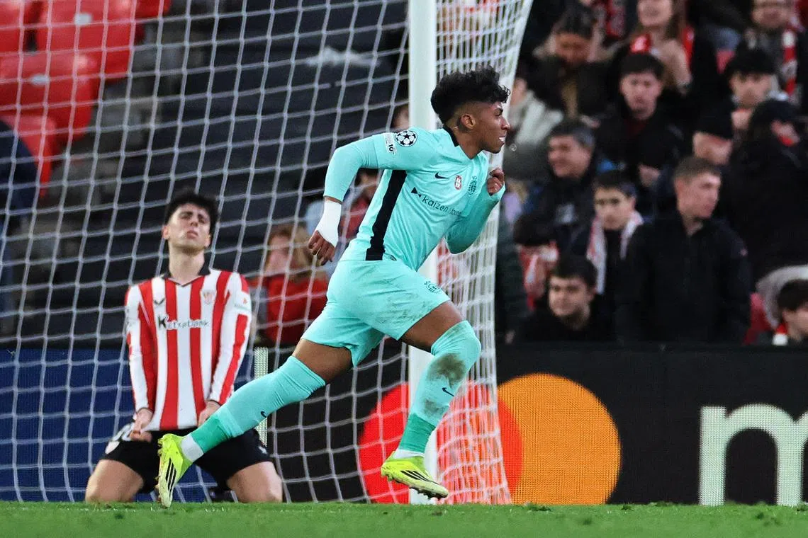 Soccer Football - UEFA Champions League - Athletic Bilbao v Sporting CP - San Mames, Bilbao, Spain - January 28, 2026 Sporting CP's Alisson Santos celebrates scoring their third goal as Athletic Bilbao's Alejandro Rego looks dejected