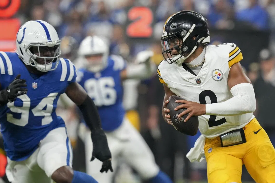 Indianapolis Colts defensive end Tyquan Lewis chasing Pittsburgh Steelers quarterback Justin Fields on Sept 29, 2024 in their NFL game at Lucas Oil Stadium in Indianapolis.