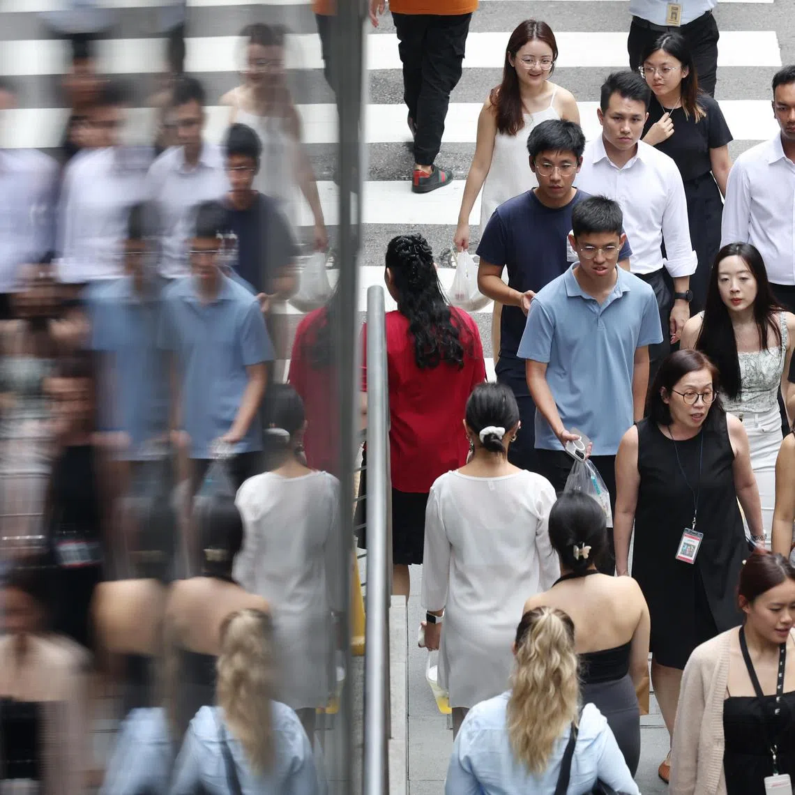 Pixgeneric / Generic photo of office workers at Robinson Road on May 19, 2025. Manpower, economy, jobs, salary, income, wages, pmet, workforce