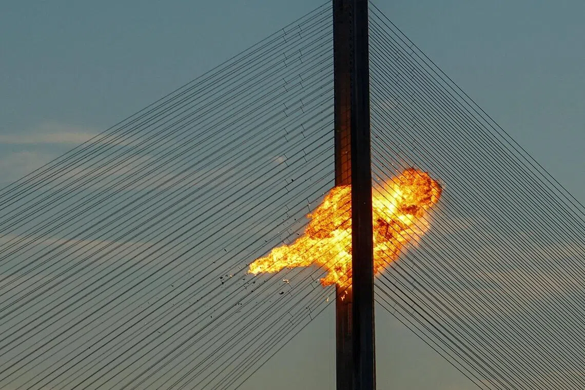 A Russian jet-powered drone striking a bridge in Kyiv, Ukraine, on Oct 2. Ukraine has accused Moscow of trying to force people to abandon Kyiv and other cities with systematic strikes on civilian targets.