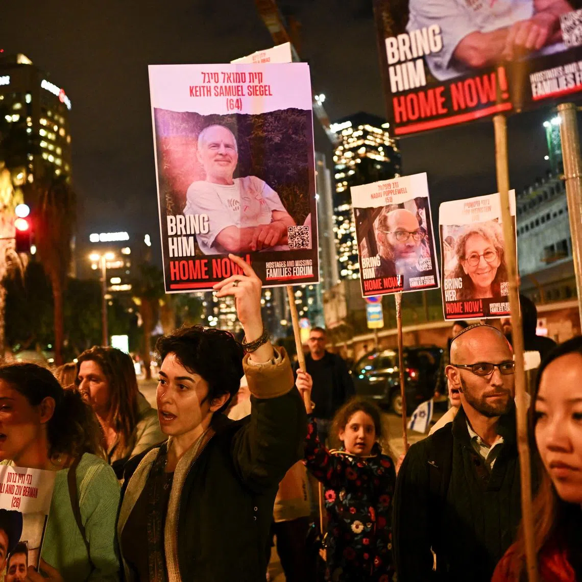 Demonstrators attend a rally calling for the release of hostages kidnapped in the deadly October 7 attack on Israel by the Palestinian Islamist group Hamas from Gaza, in Tel Aviv, Israel, February 20, 2024. REUTERS/Dylan Martinez
