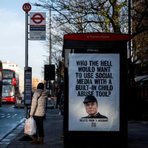 A bus stop poster in London calling for a boycott of Elon Musk's social media platform X over its lax attitude towards AI-generated images of children. 
