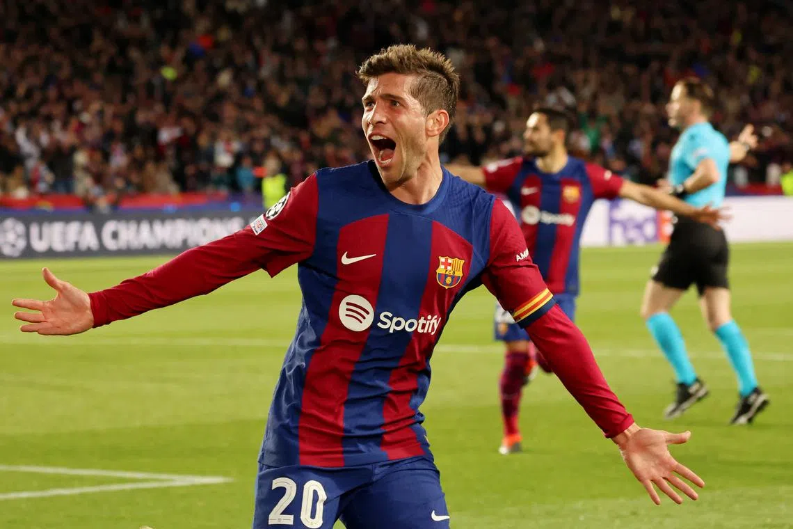 FILE PHOTO: Soccer Football - Champions League - Round of 16 - Second Leg - FC Barcelona v Napoli - Estadi Olimpic Lluis Companys, Barcelona, Spain - March 12, 2024 FC Barcelona's Sergi Roberto celebrates after Robert Lewandowski scores their third goal REUTERS/Nacho Doce/File Photo