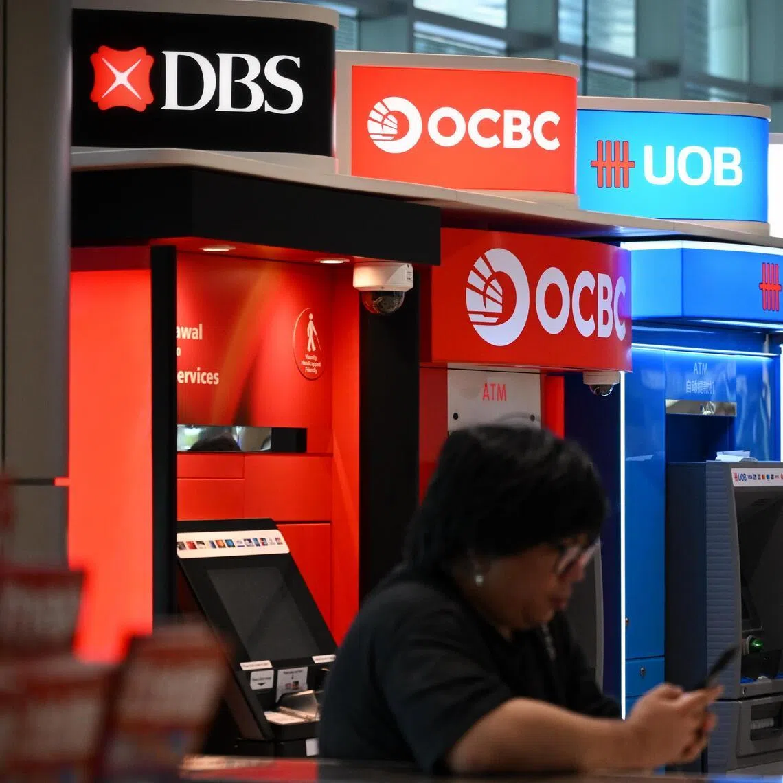DBS shares have gained more than 30 per cent in the past 12 months, while OCBC is up about 19 per cent. 