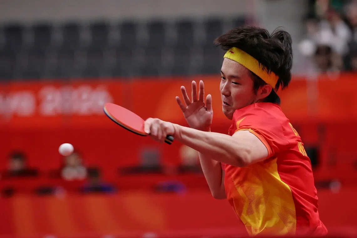 Wang Chuqin of China in action against compatriot Lin Shidong during the Aichi-Nagoya 2026 Asian Games table tennis men’s singles finals at Sky Hall Toyota in Aichi, Japan on Sept 28.
