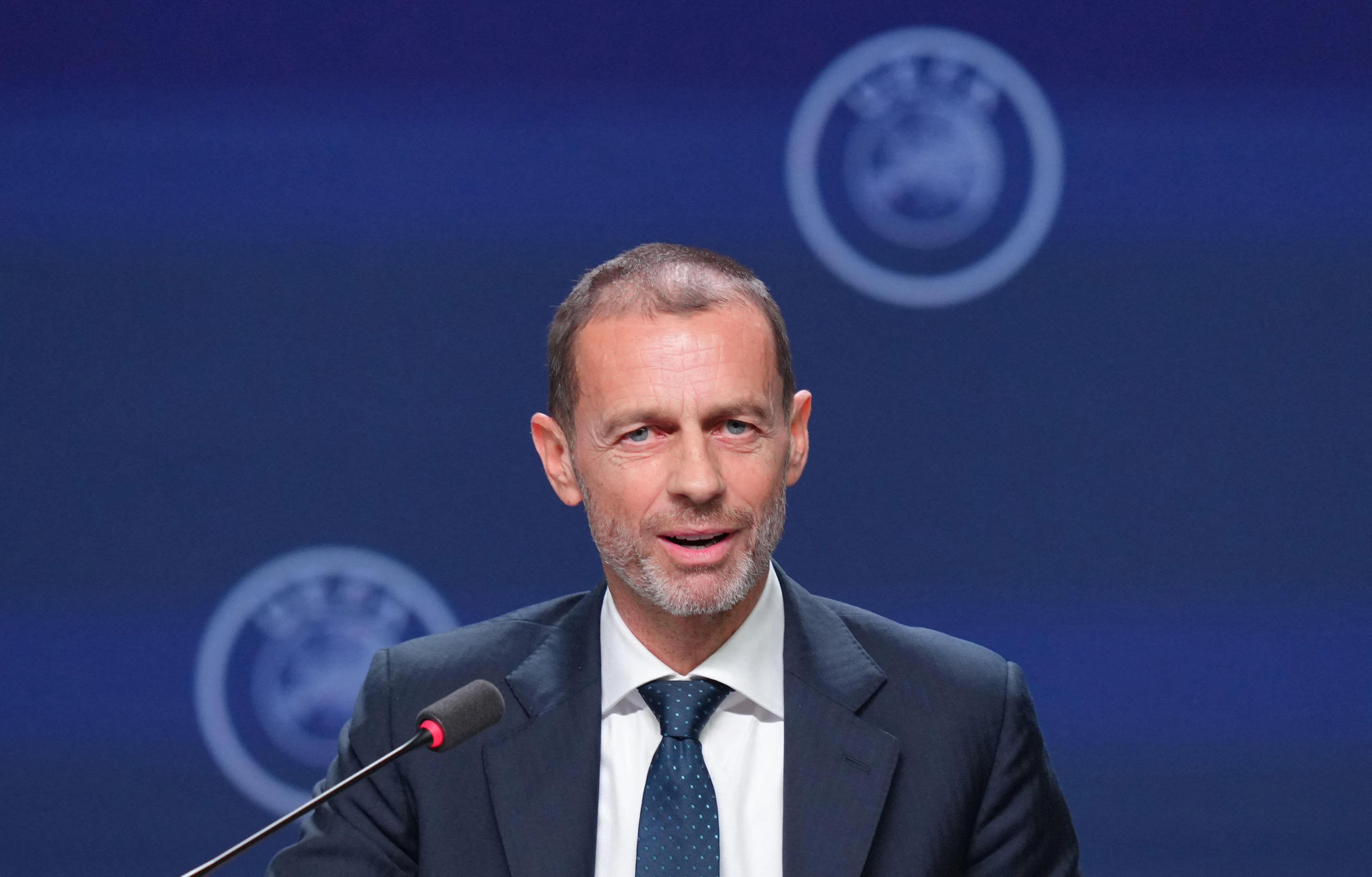 (FILES) UEFA president Aleksander Ceferin addresses a press conference at the 50th UEFA Ordinary Congress in Brussels on February 12, 2026. UEFA president Aleksander Ceferin says on August 6, 2026 one of his mantras is to "choose your battles", but European football's governing body is now locked in a bitter fight with FIFA boss Gianni Infantino. Ceferin has previously called himself an "underdog" leader, despite having been at the helm of UEFA since 2016 and pushed through a statute change which will allow him to run for a fourth term next year. (Photo by Pau BARRENA / AFP)