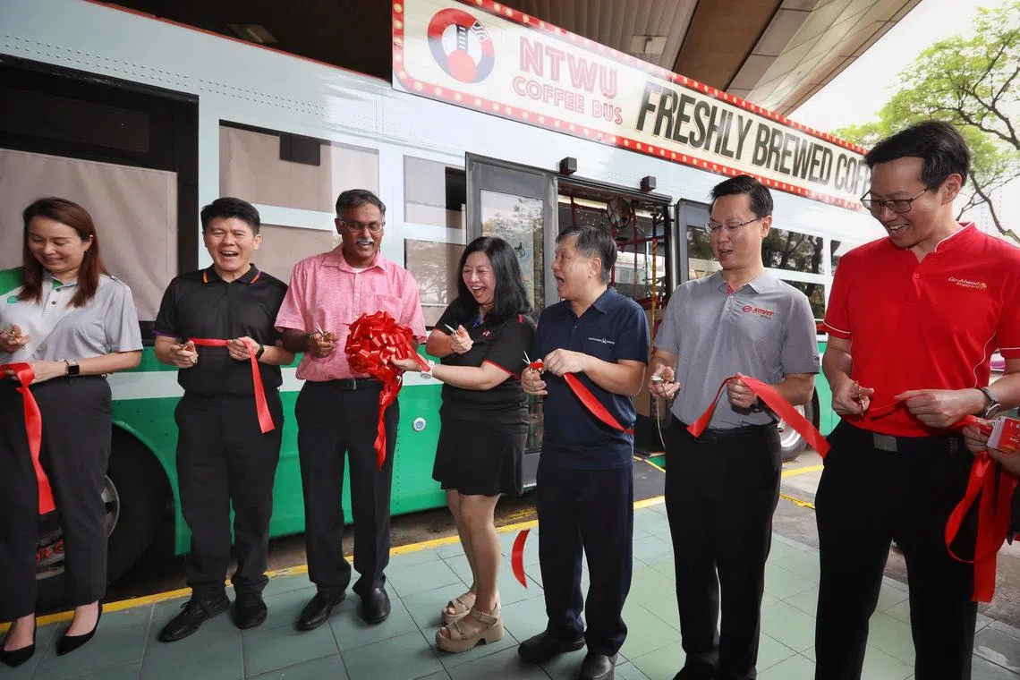 ST20250514_202597000293/sncoffee14/Taryn Ng/Ngiam Jing Ci, Stacey//

Ribbon cutting ceremony for the mobile coffee bus with guest-of-honour Mr Murali Pillai, the Minister of State for Transport and Law and National Transport Workers? Union (NTWU) executive secretary Yeo Wan Ling at Toa Payoh bus interchange on May 14, 2025. NTWU launched it to celebrate the service of public transport workers in Singapore. ST PHOTO: TARYN NG