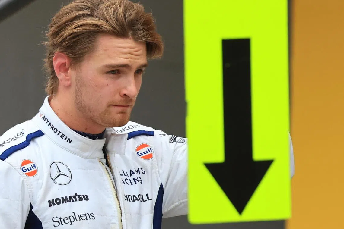 Williams' American driver Logan Sargeant on the pit lane during qualifying for the Formula One Hungarian Grand Prix at the Hungaroring circuit, in Mogyorod, near Budapest, on July 20, 2024.