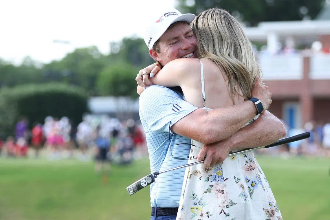 Ben Griffin of the United States celebrating with fiancee Dana Myeroff after winning the Charles Schwab Challenge 2025 at Colonial Country Club on May 25 in Fort Worth, Texas.