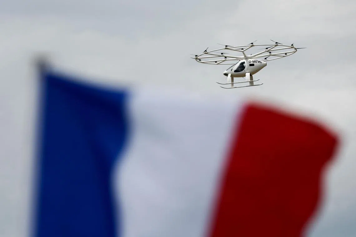 The Volocopter urban air mobility aerial taxi performing a flying display at the 54th International Paris Airshow at Le Bourget Airport near Paris on Tuesday. 