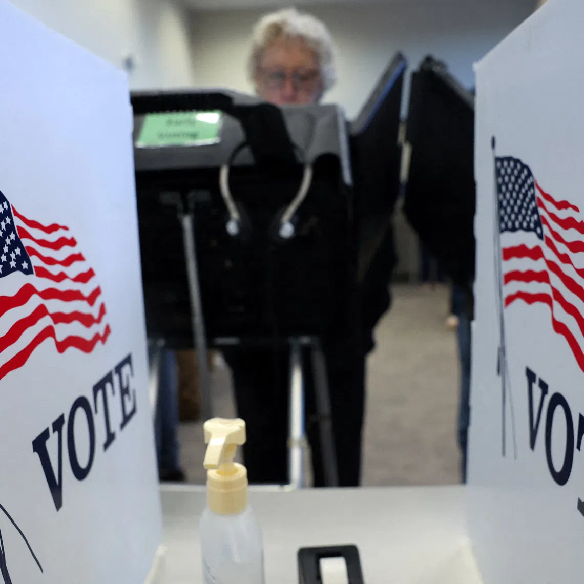 A woman casts her vote outside the Medina County Board of Elections, as early voting begins in Ohio on Oct 6.