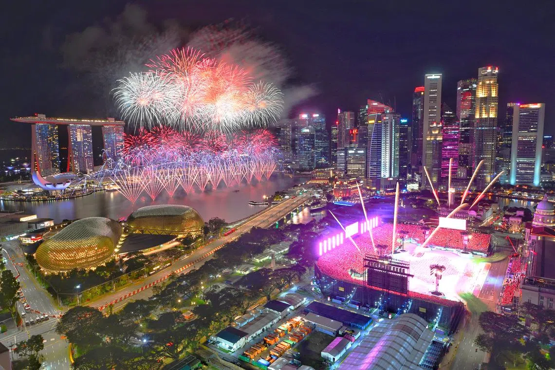 Fireworks light up the sky at the National Day Parade at the Padang on Aug 9, 2023. ST PHOTO: CHONG JUN LIANG