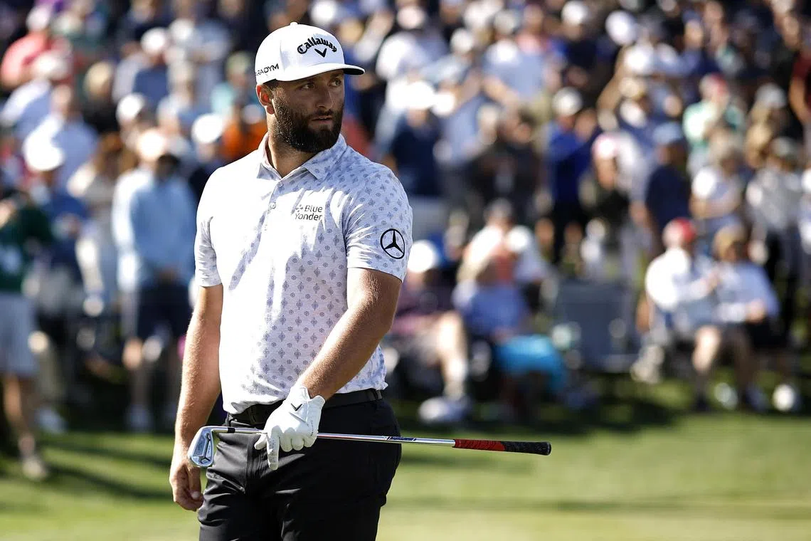 PONTE VEDRA BEACH, FLORIDA - MARCH 09: Jon Rahm of Spain looks on after hitting his shot from the 17th tee during the first round of THE PLAYERS Championship on THE PLAYERS Stadium Course at TPC Sawgrass on March 09, 2023 in Ponte Vedra Beach, Florida.   Jared C. Tilton/Getty Images/AFP (Photo by Jared C. Tilton / GETTY IMAGES NORTH AMERICA / Getty Images via AFP)