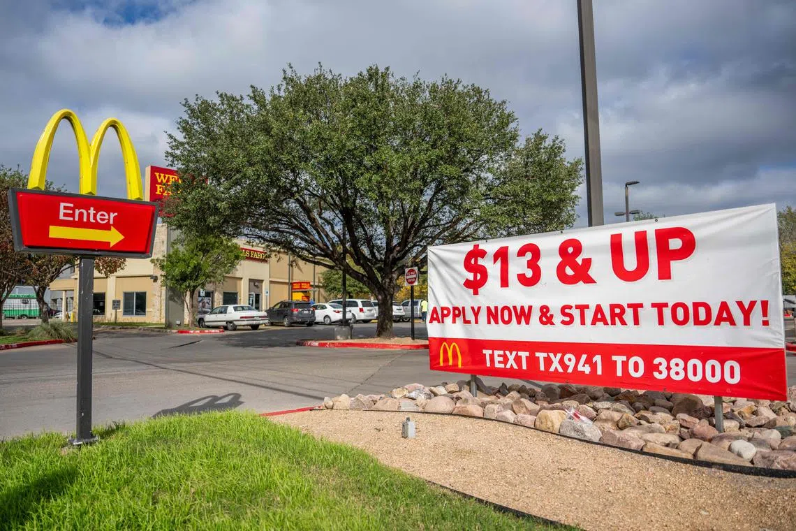 AUSTIN, TEXAS - DECEMBER 08: A sign promoting job employment is seen outside of a McDonald's restaurant on December 08, 2023 in Austin, Texas. Non-farm payrolls rose significantly to approximately 200,000 jobs in November as the national unemployment rate declined to 3.7%.   Brandon Bell/Getty Images/AFP (Photo by Brandon Bell / GETTY IMAGES NORTH AMERICA / Getty Images via AFP)