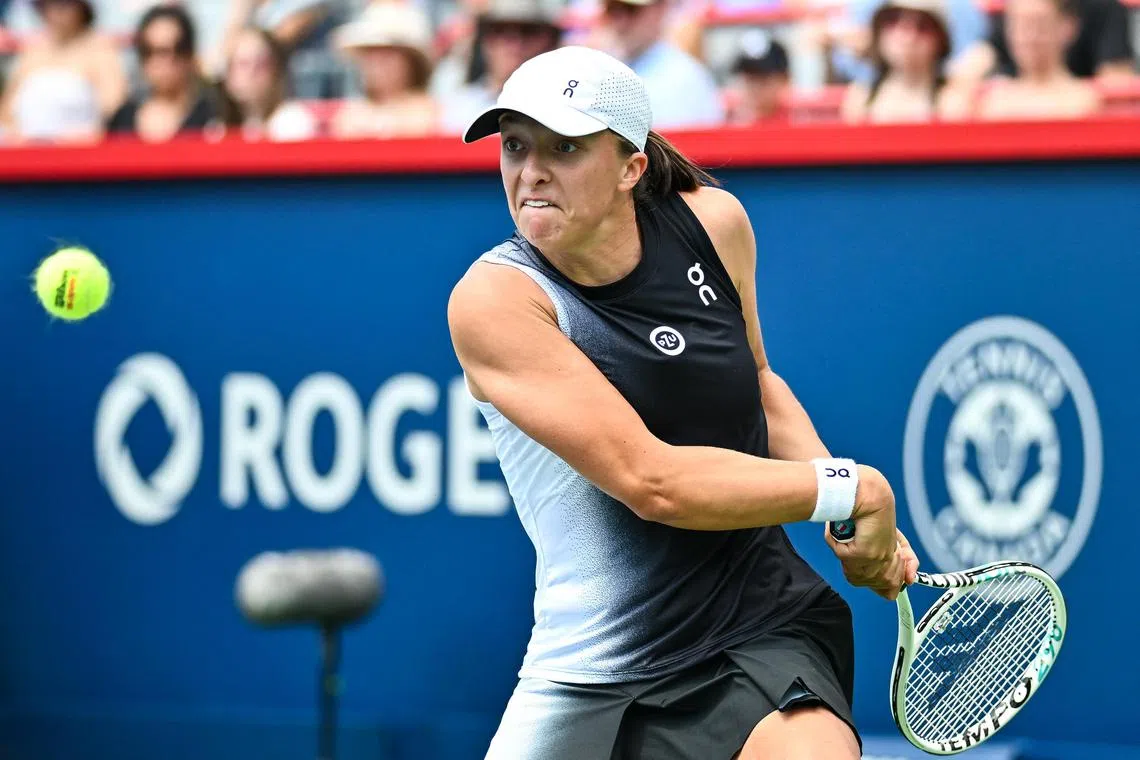 Iga Swiatek of Poland running for the ball against Karolina Muchova of the Czech Republic at the Canadian Open.