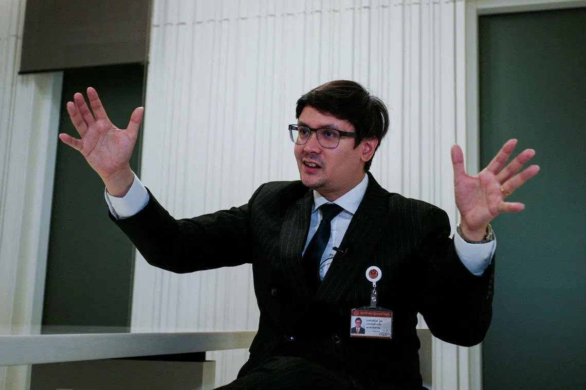 FILE PHOTO: Chair of the House Committee on National Security, Border Affairs, National Strategy and National Reform and a member of the opposition People's Party, Rangsiman Rome, speaks during an interview with Reuters amid a mounting crackdown on scam centres operating along a porous border in Bangkok, Thailand February 26, 2025. REUTERS/Thomas Suen/File Photo