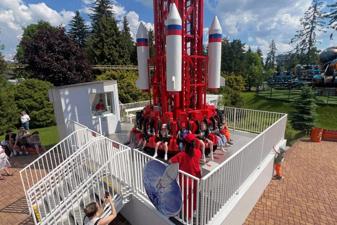 People enjoy the \"Oreshnik\" ride, named after a nuclear-capable hypersonic missile, at an amusement park in Saint Petersburg, Russia June 5, 2026. REUTERS/Stringer