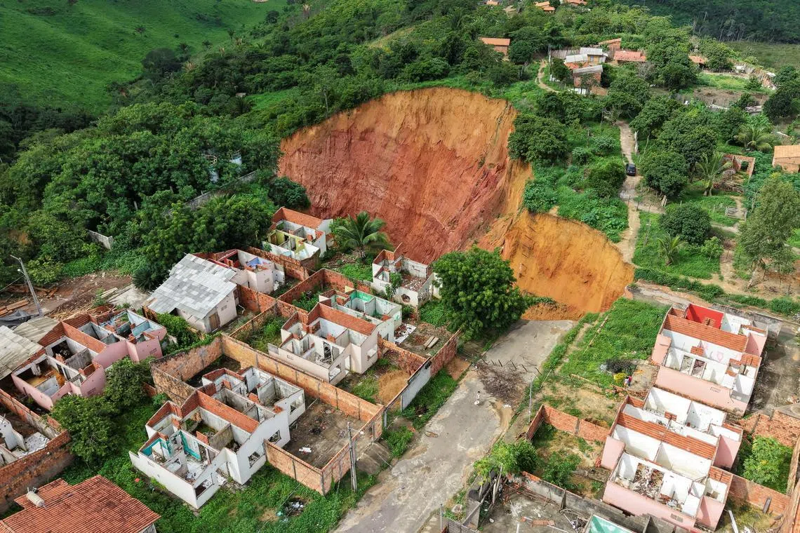 A drone view shows the town of Buriticupu, a small Amazonian town that was declared in a state of public calamity due to sinkholes that threaten the community, in Buriticupu, state of Maranhao, Brazil February 20, 2025. REUTERS/Mauricio Marinho
