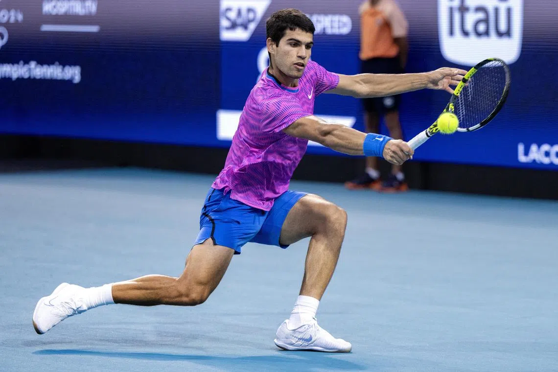 Carlos Alcaraz of Spain in action against Lorenzo Musetti of Italy during their Miami Open round of 16 match.