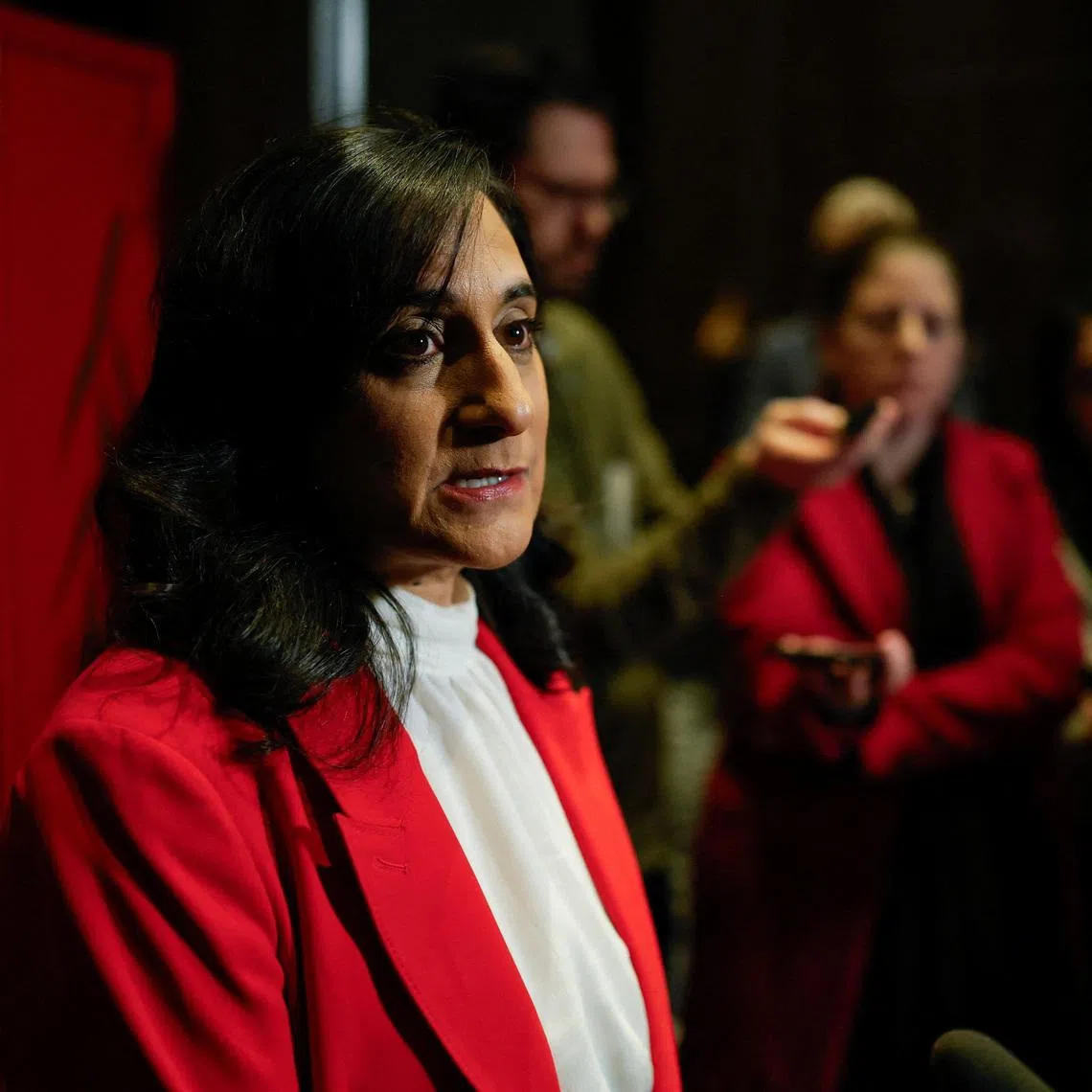 Canada's Minister of Foreign Affairs Anita Anand speaks to members of the media after arriving in Beijing with Canada's Prime Minister Mark Carney, during the first visit by a Canadian Prime Minister to China since 2017, in Beijing, China January 14, 2026.  REUTERS/Carlos Osorio